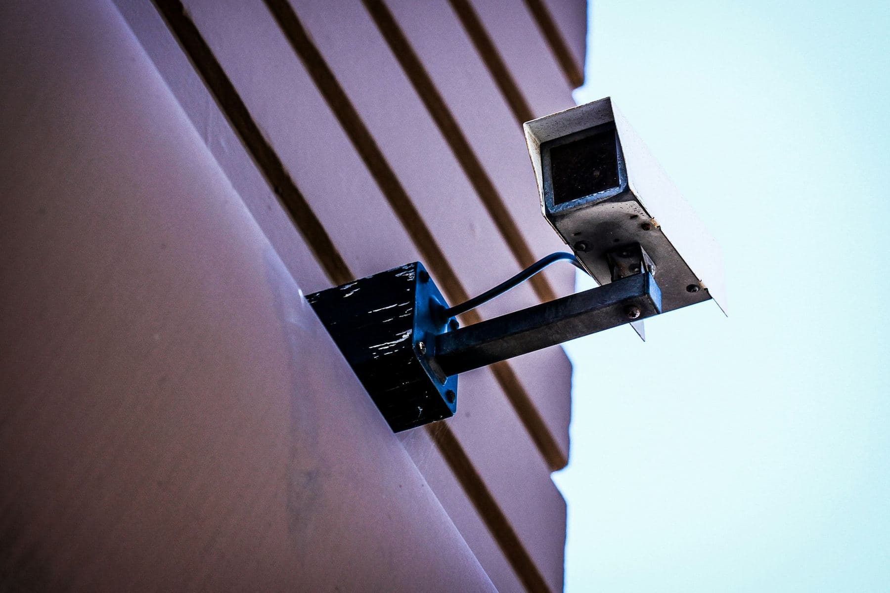 A CCTV camera mounted on a building wall